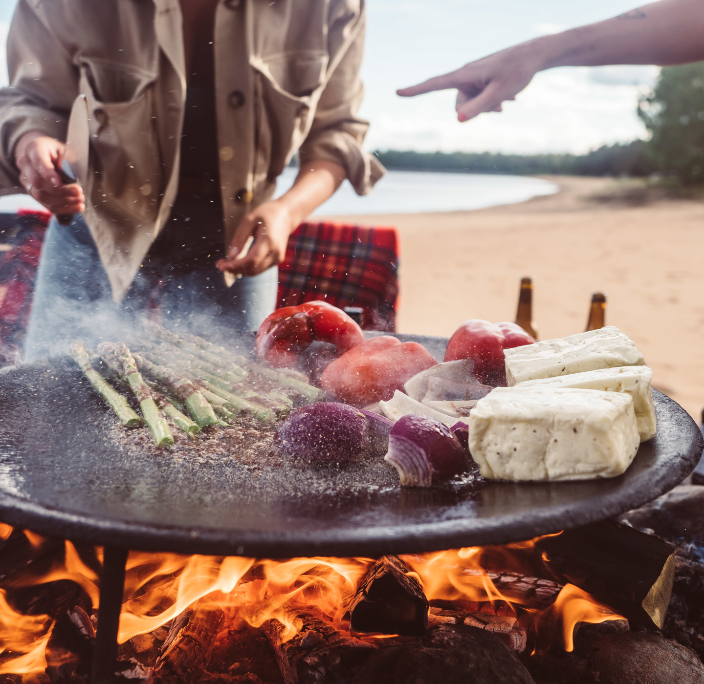 Food being prepared over open fire. 